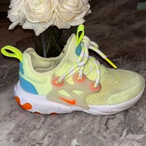 Nike Yellow and Blue React Sneakers Dynamic Design